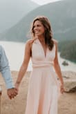 This dress is so soft and lovely. I am really into the convertible straps - almost bought these for my bridesmaids (doesn't come in the size of one of the girls). The fabric is a little heavy so the straps are more obvious on my frame. Wore it for my engagement photos! - Haley R.