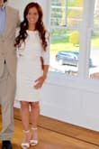 I purchased this dress to wear to our Jack & Jill in April in Connecticut. I wanted something with a sleeve because it's typically not that warm yet and it was great (it was an indoor event anyways). I got SO MANY COMPLIMENTS on this dress everyone wanted to know where I got it. It was a little tight but I got the XS because S was out of stock and it still worked great. The buttons on the back made me nervous because they did stretch out every time I hugged someone but none of them broke in the over 4 hours I wore it. It is very form fitting so definitely needed spanx to avoid panty lines and it also shows your belly button pretty prominently. Not the highest quality fabric or dress in general but worked great for 1 event. - Laura K.