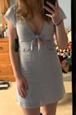 The cut of the chest was weird. You could see the edge of my bra no matter how tight I tried to tie the front knot (as seen in picture). I tried the dress on with every bra/bralette I owned, and every one of them could be seen (I buy mine from pink in case that matters, and they're light to no push-up). Wasn't comfortable enough to wear the dress without a bra, and I think a strapless one would have been even more visible. I ordered a small and it fit perfectly otherwise. I would have kept the dress if it wasn't for the bra issue! Girls with smaller chest sizes may not have this problem - Rachel S.
