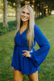 I bought this romper to wear for my senior pictures and it was gorgeous! The blue was a perfect color and it was super soft and comfy. This was one of the only rompers I've bought that was long enough for my body type. - Rachel B.