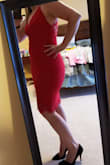 Love it. The lace back and slit provide a fun and flirty feature. Was originally leaning toward black, but the red was beautiful. Will be a fun date night dress, but was plenty sexy for a night out on Vegas. The only place it was a little loose was in the chest, but it wasn't a deal breaker and still looked good. The material is thick and forgiving, and a bit stretchy. - Stephanie C.