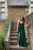 This is an absolute head-turning outfit! Gorgeous forest green color :) Wore it to a wedding with 4 inch heels and it was the perfect length...if I was shorter or had worn shorter heels, I would've probably had to get it altered. Nice and light weight material! Straps are stretchy which is kinda nice when getting it on/off. It is a little snug around the waist mixed with the perfect amount of flow making it super flattering!!! <3 Can't wait to wear it again! - Mackenzie S.