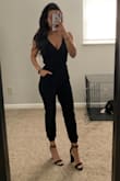 I usually am a S but tend to go with XS for jumpsuits since I'm only 5'2". When I first received the XS I was in love with the fit - it was just like the photos and perfect for that relaxed yet put together look. However, after one wash I can notice a huge difference - it shrunk more than a little and no longer has that relaxed look. I'm okay with that since it still fits, but I would say to order true to size even if you're tempted to size down. Photo is after the wash. Overall, the jumpsuit is super cute and can be dressed up or down. I love that you can adjust the halter tie to accommodate your bust size. Definitely a staple for your wardrobe! - Taneesha P.