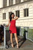 I love this dress. The straps are a bit too long and it looked a little awkward where the hips were because the dress is shaped to fit snug to a body shape. I'm 5 feet and very narrow so it didn't match up perfectly but I love it nonetheless. The material is thick and extremely good quality. Overall satisfied! - Kim T.