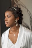 I bought these Loving You Gold Rhinestone Earrings and wore them on my wedding day. They look heavy but they are actually pretty light. I received a lot of compliments. I love them, they are elegant, stunning and beautiful. - Kalenga M.