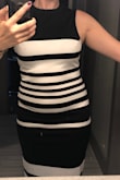 This dress fit perfect and is super flattering. It's surprisingly a thinning dress, which I don't suspect from horizontal stripes! Great office dress. - Alecia G.