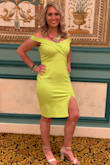 This dress got SO many compliments at the Las Vegas wedding I wore it to. It is baggy on me in the midsection, so I was trying to hide that in photos. I would size down if given the chance, but I also may just have it altered to wear in the future. The dress is comfortable and the color is so funky! - Jessica J.