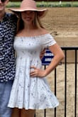 This dress is cute and fun but a little short when bending over or raising my arms up. I ordered both the Medium and Large. The Medium fit better on me. - Amelia A.