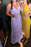 Wore it for a summer wedding and it was perfect. The open back kept me cool in the sun and I got so many compliments on it. Perfect for dancing except the back was a little long so I had to wear tall heels but overall great dress. - Katie H.