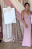 Loved the dress. The material is thick and hugs your body. It is true to size but has a stretch. I felt comfortable all night. - Tanya R.