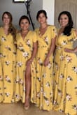 Wore this dress as a bridesmaid. Loved the color, nice fabric (elegant enough for a summer wedding), wrap around design gives you an amazing figure (hugging all the right places). Would highly recommend.

Perfect bridesmaid dress for a tropical wedding. - Karla M.