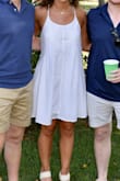 I bought this dress for my engagement party and it was perfect! We had a backyard party in the middle of August and it was the perfect flowy dress to keep me cool and looks adorable on! It is lined so is not see-through which was really nice, especially in the summer outside. I am 5'2" and it was the perfect length dress to wear with wedges. I would recommend this to anyone looking for a more casual white sundress for any bridal/engagement/bachelorette needs! I did have to have it pressed at the dry cleaners because of wrinkles from shipping, but after that it was perfect! - Megan L.