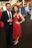 I'm obsessed with this dress. I bought it to wear to 3 weddings, 3 weekends in a row, and it did NOT disappoint! I wore it with black heels, big statement earrings and a leather jacket, and I felt like a knockout. The "rust red" color is beautiful. I also ordered it in olive green but ended up returning that one because I loved the red so much. -
The Fit:
I have a smaller rib cage and bigger hips, so I probably could have gone a size down and been okay. I was worried it would be tight across my hips (wasn't an issue) but I had to tighten the lacing on the back quite a bit to make sure it fit properly there. I found it pretty forgiving in the hips/butt. -
Some Tips:
Came super wrinkled from shipping, but I used a little handheld steamer on it and it looked great. Obviously you can't wear a normal bra with this, so I bought some gel pasties and fashion tape and that worked just fine. Definitely invest in fashion tape for this one. I forgot it one night and spent the whole time worrying "the girls" would pop out for a visit. I'm not used to wearing anything with this deep V of a neckline, so maybe I was just paranoid. :) -
Overall, this dress was a huge win! I'll probably order it in another color or two for the future. - Miranda A.