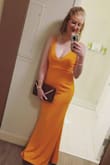I bought this dress for a black-tie wedding in June and it was perfect. Very comfortable, the right length for me (in heels), easy to dance in! The orange color was arguably the best part. I ordered a size small. - Kelsey F.