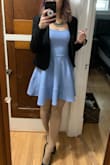 Loved this dress for a May 4th wedding! The fabric is interesting, but a bit stretchy compared to the black one I own. Which is better IMO. I had funky hair color at the time so it really paired well. - Diana T.
