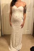 I bought this dress for my wedding next August. I'm currently 18 weeks pregnant and this dress has a bit of stretch to it so I was still able to try it on. It is super comfortable & fits like a glove. I tried on wedding dresses worth way more and did not love them as much as I love this dress!

Update 1 year later: The dress fit perfectly, I had SO many compliments. I could not have been happier with this dress. - Rachel W.