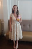 I wore this to my bridal shower and got so many compliments! It was the perfect combination of classy and sexy. I am between small/medium and went a size up to accommodate my shoulders but it was a little big in the waist and bust. The dress itself is super comfortable! I love it so much I'm looking for more excuses to wear it! - Melissa D.