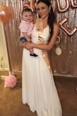 Beautiful dress! The only reason I gave it 4 stars is because it is so long! I am 5'7" and even with heels on it touched the floor. If you're shorter I wouldn't buy this dress unless you want to get it hemmed! - Aubrie H.