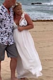 I absolutely love this dress!! I wore it for my beach wedding which we chose to be a casual affair and it was absolutely perfect! It was a windy day and it made the dress that much more stunning, the way it billows in the breeze. - Kimmi M.