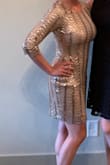 I truly loved this dress but for whatever reason right at my hips it had a weird wrinkle effect that no matter what I did I could get it to flatten out so that was a little frustrating but all in all it was absolutely stunning for my Nashville bachelorette and I got so many compliments! - Jen D.