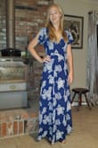 I absolutely love this dress. I am normally a small but since this is a wrap dress, the x-small fit much better. Perfect length to wear with a 1-1.5" heel. - Kayley B.