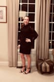I thought it was going to be tighter more like other bodycon dresses but it was looser then I thought but it still fit great and was a little more comfortable being loose, the sleeves were a little long on me. - Kayla D.