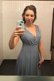I did like this dress and it was very comfortable to wear. However, I had to spend 80 dollars in alternations and I did somewhat change the look of the dress because I made the top more form fitting. I am 32D/DD and I still found it very loose around the bust and I wanted a tighter look. It was kind of difficult because the material on the bust is very loose and has that "grecian" look and it was hard to make the pleats on both sides looked even. The flow of the dress is very nice and I loved the colour. I wore a stick on bra and boob tape over top of it to give a lift to my cleavage. 
I ordered a Small, was a bit nervous but it fit. I also have larger hips and a butt!! - Olivia L.