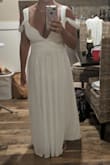 I love this dress, very pretty! I wore this for my beach wedding and it looked absolutely perfect, it was exactly what I pictured. Because I am not tall I did have to get some length taken off and the straps taken in a little so my bust was popping out but it was easy fixes. I would definitely recommend this dress. - Jessica N.