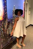 I brought this dress for my birthday and I love it. It runs a bit big. I purchased a medium and small. I kept the small. The neck was annoying but that's because I hate that turtle neck feel. But other than that I love this dress! - Fatimah G.