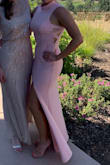 This was a great conservative formal dress that was still sexy by being form fitting and showing a little skin on the side and leg. The neck was a little loose than I would have liked but other than that, fit great. - Nikki K.