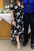 I wore this to a wedding, loved the flattering waist and the high-low look. Very nice fabric. It was super low cut though and I have large boobs so I safety pinned it together and to my bra, but it was still too busty! I will buy an undershirt next time I wear it. - Michelle H.