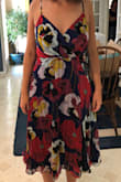 This dress had beautiful colors, but it was a bit big. It seemed like there was too much material at the waist. Had I not found another dress, I likely would have returned and sized down. But it's super comfy and satin lined, and the straps are adjustable. - Kerri B.