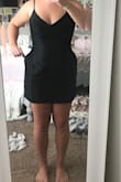 It is very tight on the upper body and has no stretch like the description says. The pockets would be nice but the stick out a lot. It is a little short. It could be cute on the right person. Will be returning. - Reagan L.