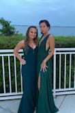 I had to get the length fixed, I am only 5'0 so I probably would've needed it done anyway. The color is more of a teal than forest green in my opinion but absolutely beautiful! - Kendall M.