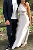 Comfortable, sexy, beautiful, and classic. I wore mine as a one shoulder and got so many compliments. With a pair of reasonable heels it was the perfect length, and I wore it all day long. It does stain easily, so be aware. But otherwise, it was perfect! - Sophia B.