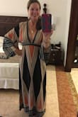 This fit perfectly and I received many compliments. It's long. I'm 5'8 and wore heels and it was perfect. Didn't need a bra, just used petals. Highly recommend! - Jennifer K.