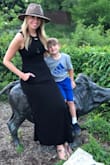 This dress is so simple yet sexy. Can be dressed up or down. I couldn't wear heels or a wedge with it as it was too short but that was fine with me. It's very form fitting, I probably should have ordered a medium but I still love it and wear it often and the front kangaroo pocket is so great! - Alexis H.
