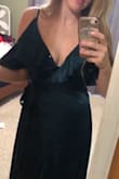 The dress fit great everywhere but the chest for me. A medium would work better for the chest but would be big everywhere else. The wrap portion was almost too big for me. - Natasha M.