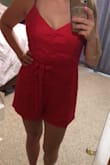 Light weight and thin fabric. Good beach romper. Looks more red in person than coral. - Natasha M.