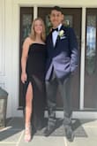 I bought this dress for my boyfriends prom and it was absolutely perfect!!! It's elegant but simple and fits like a glove!! The dress stays up and the wrinkles in the front make the dress even more flattering - Erin H.