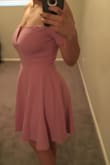 I ordered a medium since that was the smallest available at the time and it's a little big. On the sizing chart I am between a small and medium. It still looks great and the fabric is good quality. It looks good with and without a bra. - Ricki C.