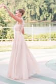 This dress is beautiful and fit perfectly. It was long for me even w heels. It wasn't true to color as pictures which was a little disappointing. I bought it for family formal pics and it was  perfect and I loved it. - Shari J.