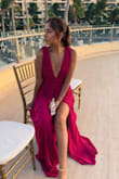 I love the color of this dress and the slit makes it look a little sexy. Perfect dress for a summer wedding! - Ariana R.