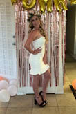 Wore this dress for my Bachelorette Party and absolutely loved it! The Fabric is tight buy stretchy enough to be comfortable dancing (& eating). Also is thick so you do not have to worry about it being see through! - Abby D.