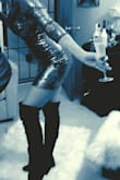 Shiny sexy dress. Perfect for NYE & Vegas. Ordered a small. Great fit :) Loved wearing it with tall black boots! - Stefanie P.