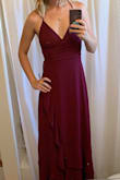 This dress is gorgeous! The color is a beautiful wine & it's so flowy when you walk. I didn't keep it because I liked another one even more! But I'll be back to buy this one for our next event for sure! - Melani P.