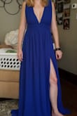 Although I opted to go with the light blue color to better coordinate with my boyfriend who is wearing navy as part of the bridal party, I loved this dress. The color is vibrant and the style is easy to wear. Definitely go braless or with stick-ons for this. I like the silicone in the top of the straps to help them stay up, though you'll still need to watch your posture. I would need to hem this even with 5" heels (but I'd expect to). Strangely, this color was ever-so-slightly less fitted than the light blue version, but still fit. If I had more reasons to wear a formal dress I would've kept this for sure. - Erin W.