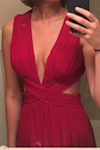 It is a vibrant magenta color, not a pretty plum purple as shown in the photo and described. (Lulus likes to comment on reviews and offer a solution to reach out for problems with orders but this literally word for word says plum purple, your photos are plum purple, and this dress is PINK, please don't bother with the cookie cutter response) the back fits weird. - Jennifer L.