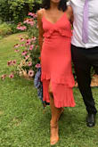 Wore this dress to a summer garden wedding. I loved the color and the great ruffles detail. The fabric has a slight shine to it and I didn't need to accessorize much. Perfect for dancing, too, as it flows with you. The shoes are also from Lulus and matched the dress perfectly. - Laura V.