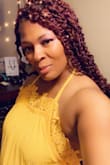 The dress is beautiful looked better than I expected. - Shanique L.